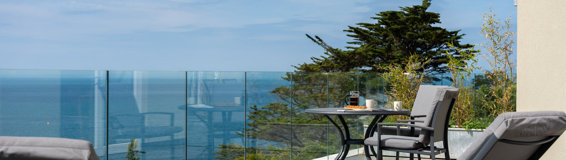 Luxury holiday apartment with a private terrace overlooking the sea in North Devon—ideal for couples, wellness retreats, and slow mornings with coffee.